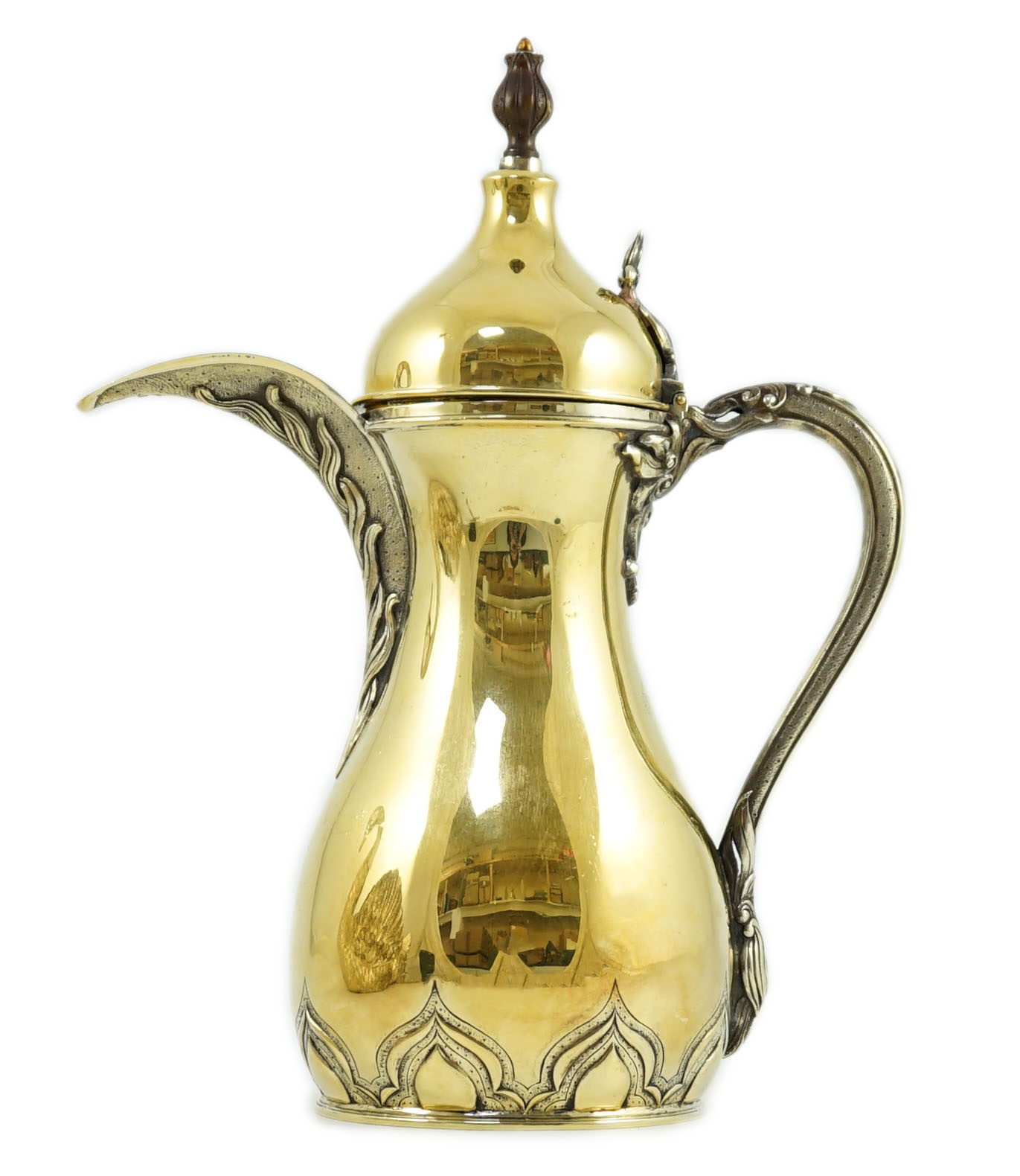 A late 1970's parcel gilt silver coffee pot, modelled as a dallah, by Asprey & Co Ltd